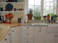The white cabinetry keeps the look fresh