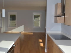 Open galley kitchen with a convenient island too